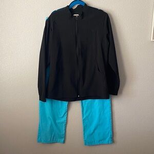 Scrubaid Black Scrub Jacket and Cherokee pants.